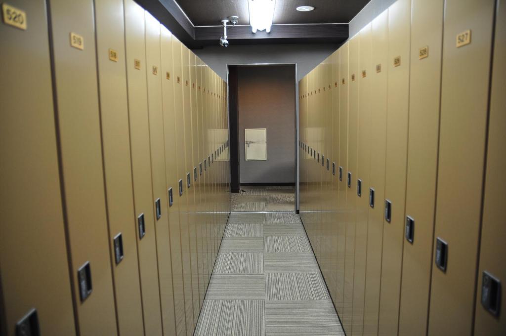 Capsule Hotel & Sauna Ikebukuro Plaza Tōkyō Extérieur photo
