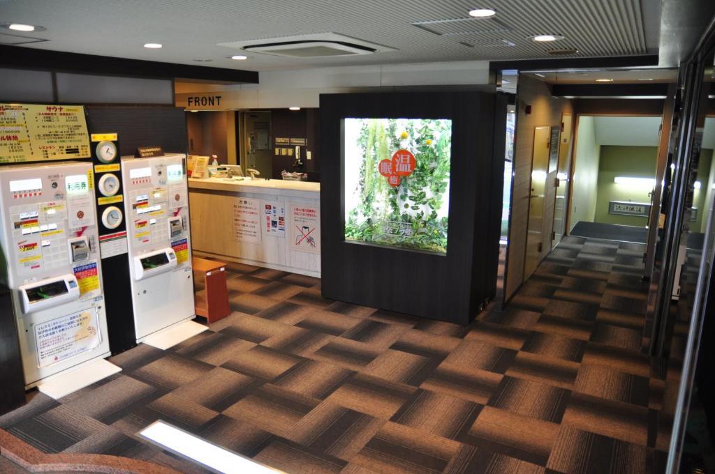 Capsule Hotel & Sauna Ikebukuro Plaza Tōkyō Extérieur photo